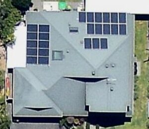 photo of a roof showing solar panels