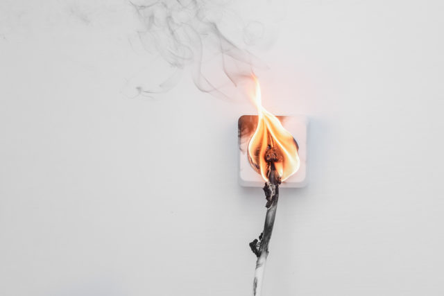 wire coming out of wall on fire due to electrical short circuit